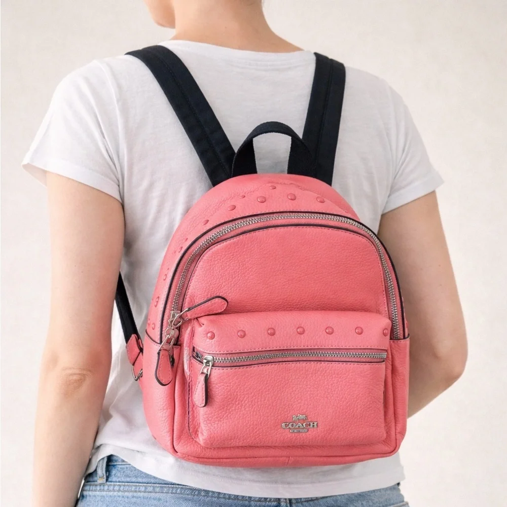 Coach Coral Pink Pebbled Leather Mini Backpack with Black Straps
